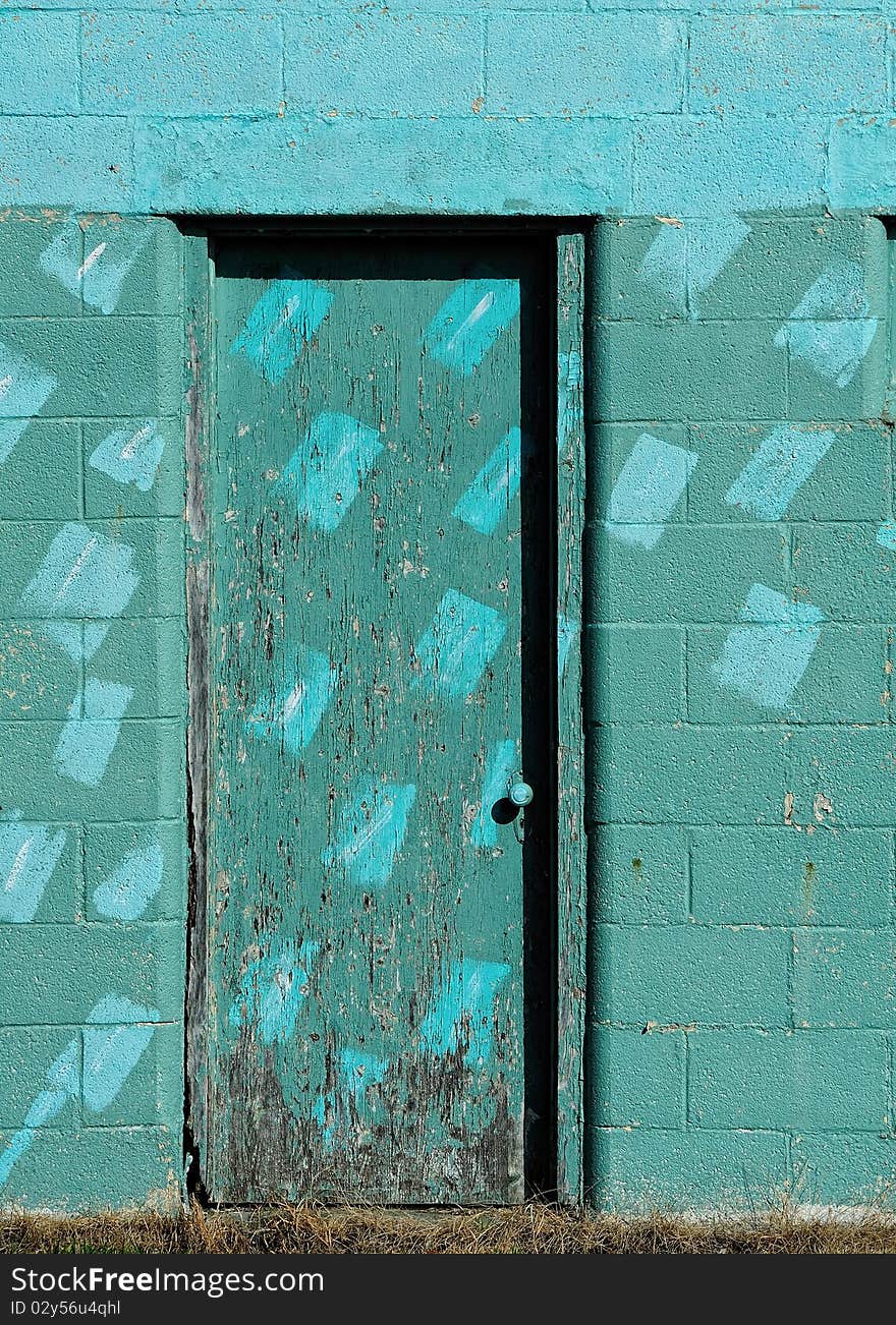 Closeup of a textured turquoise door