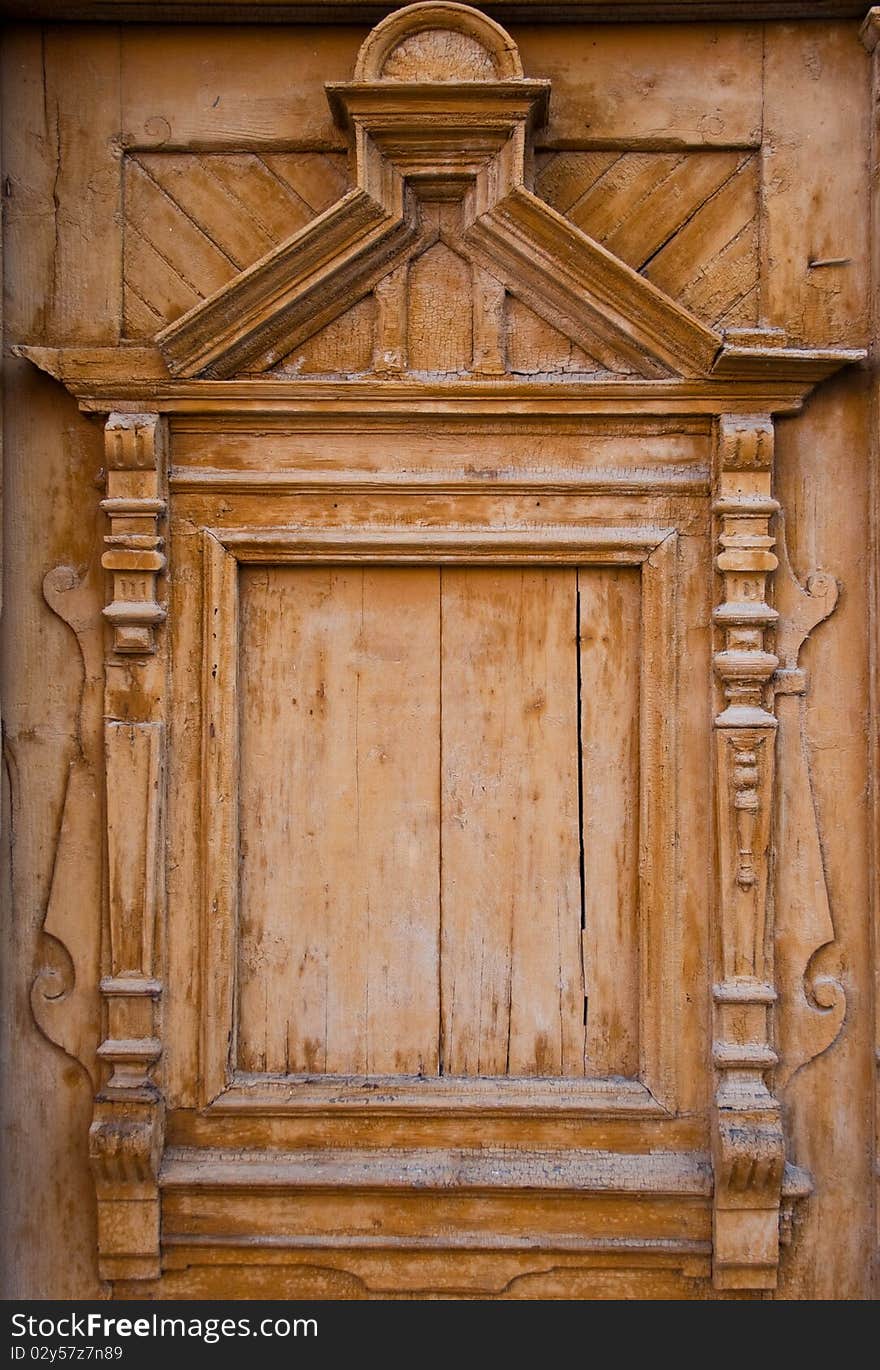 Wooden sculpture door detail used for background. Wooden sculpture door detail used for background