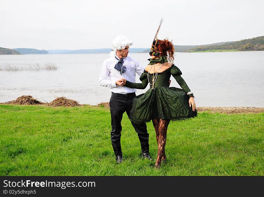 Lady and lord dancing on grass