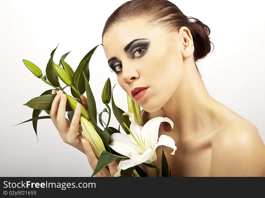 Young beautiful woman with flowers roses. Young beautiful woman with flowers roses