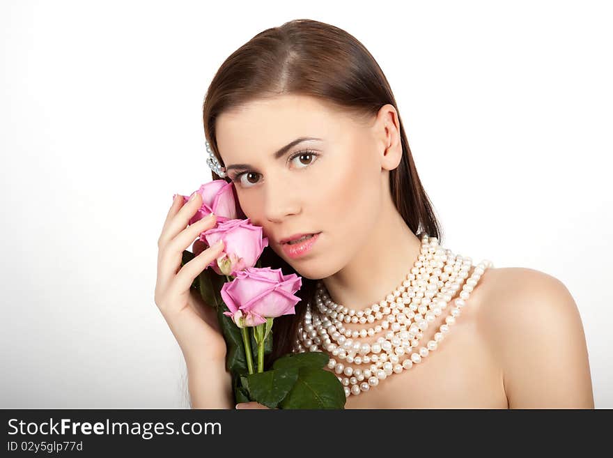 Young beautiful sexy woman with flowers roses