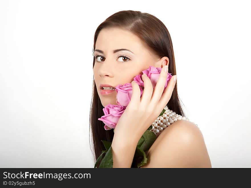 Young beautiful sexy woman with flowers roses