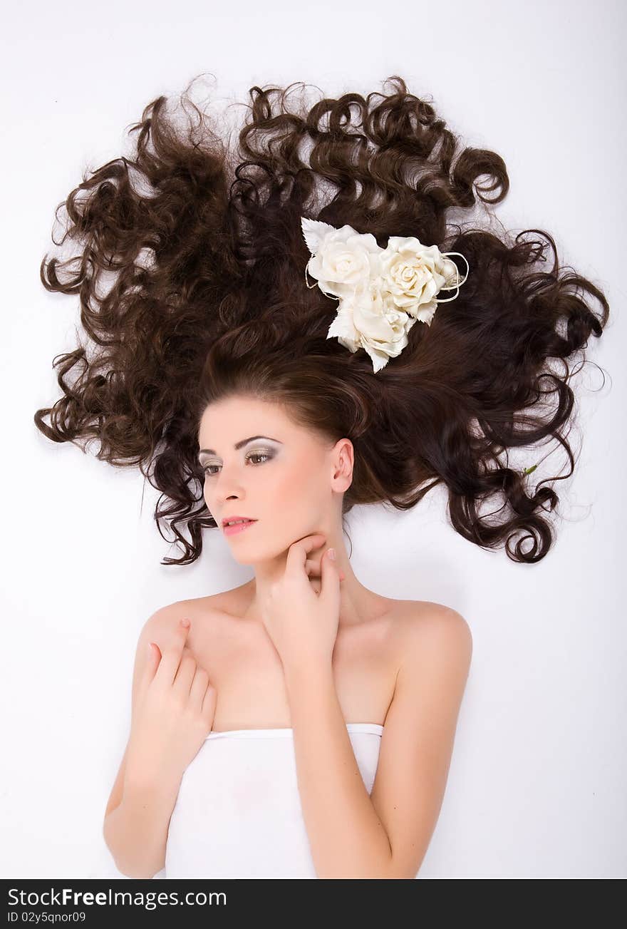 Young beautiful sexy woman with flowers roses