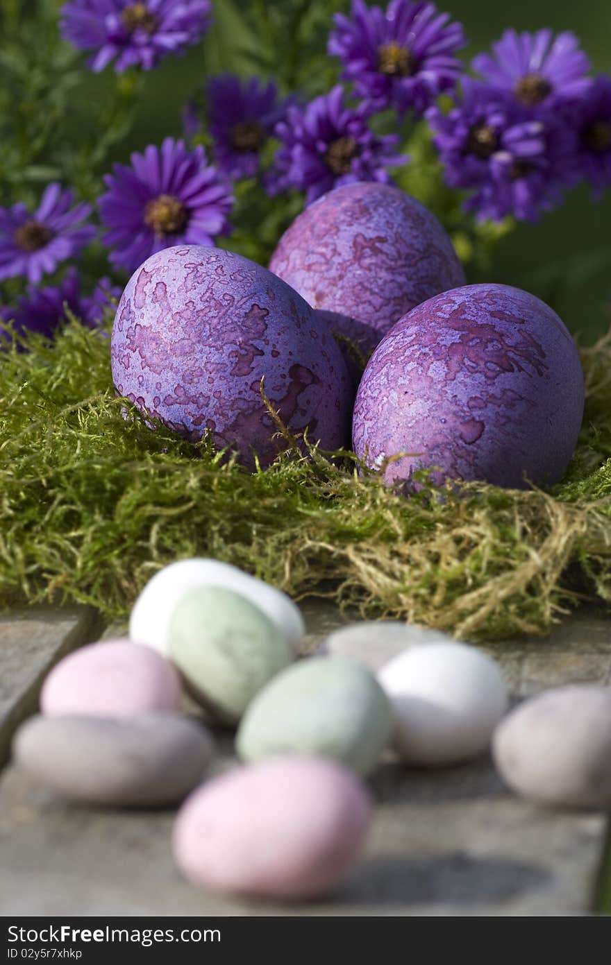 Easter eggs in pastel color in the nest