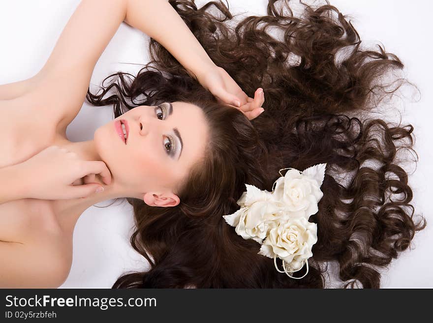 Young beautiful sexy woman with flowers roses