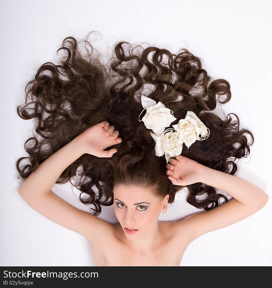 Young beautiful sexy woman with flowers roses