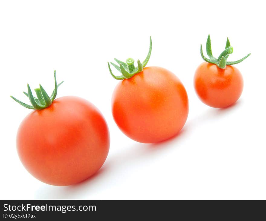 Red cherry tomato, on white background