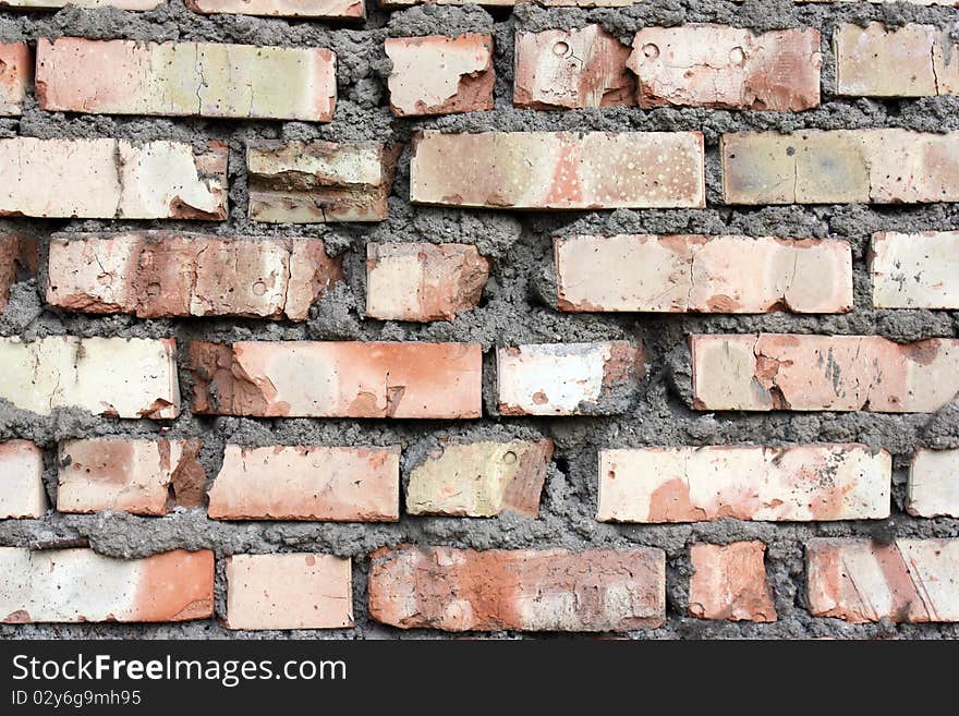 Soviet old red brick wall with the fixing cement. Soviet old red brick wall with the fixing cement