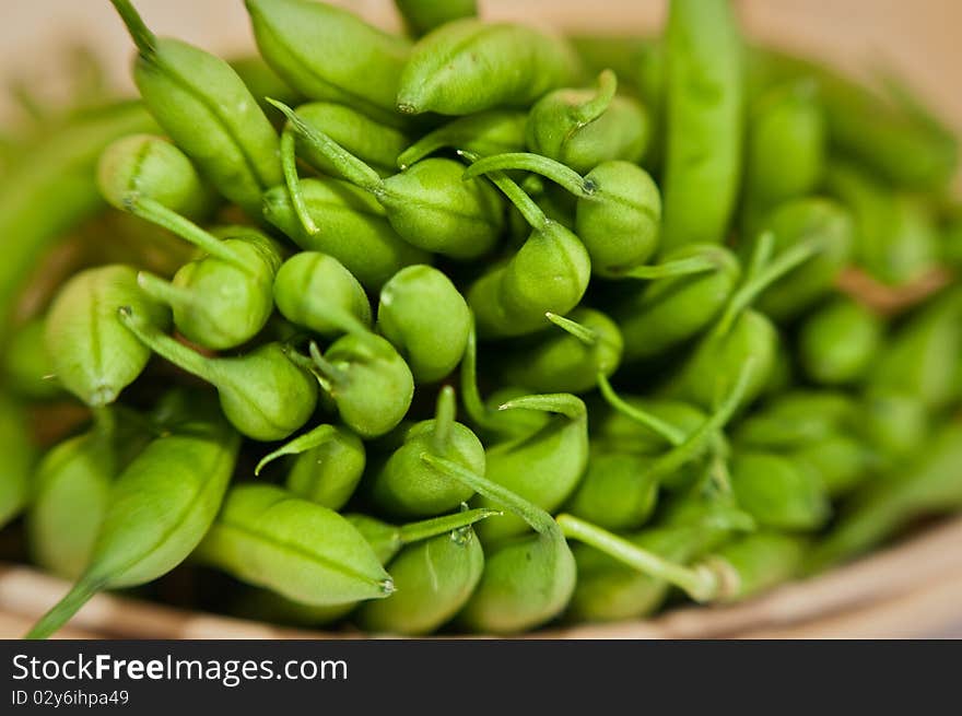 Close-up of the basket of green beans (intentional blur, Lensbaby). Close-up of the basket of green beans (intentional blur, Lensbaby)