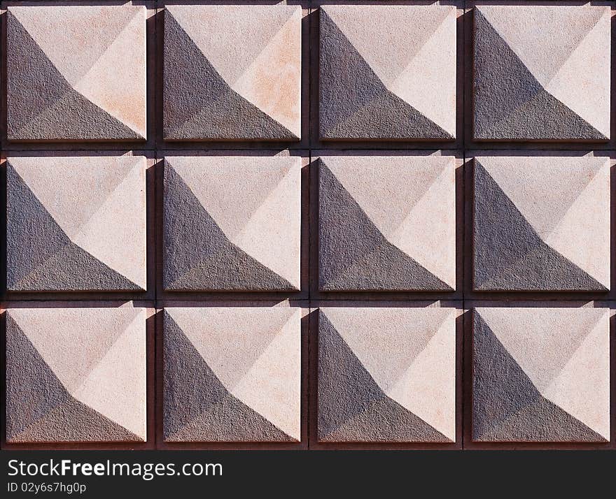 Modern beige colored concrete wall texture; great as a seamless background. Modern beige colored concrete wall texture; great as a seamless background