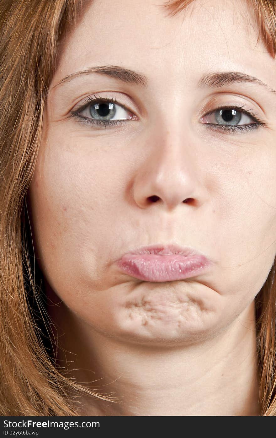 Portrait of blonde girl with pout