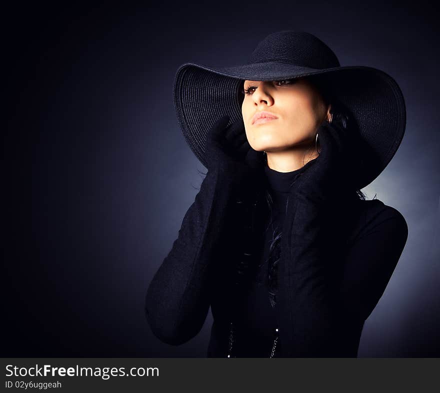 Attractive Girl In The Wide-brimmed Hat