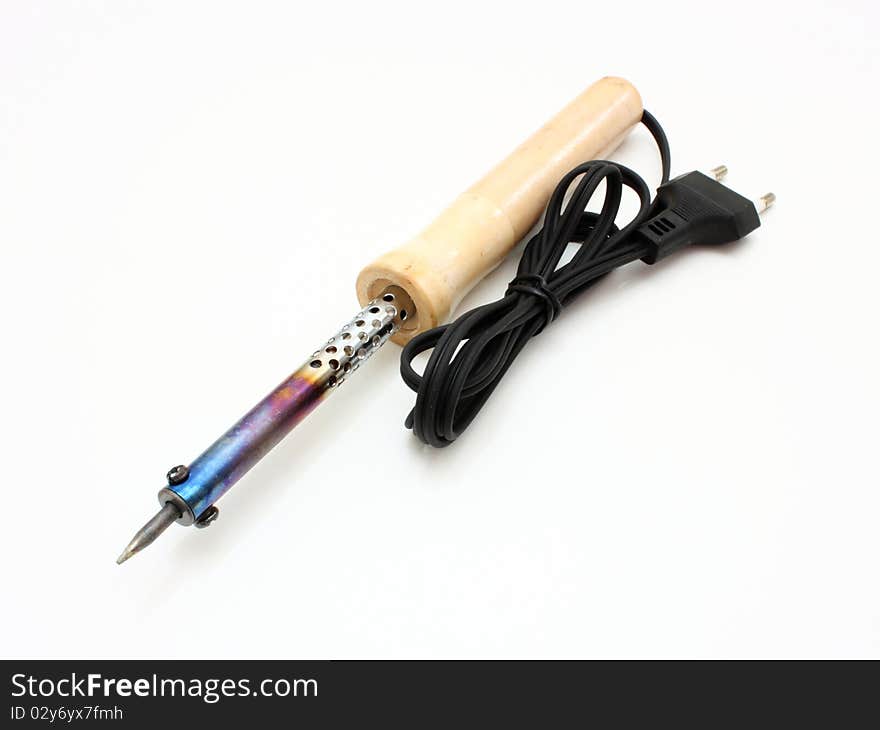 A soldering iron isolated on a white background