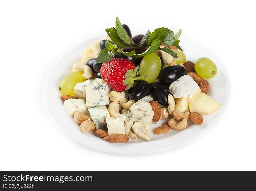 Cheese plate with grapes, nuts and strawberry. Cheese plate with grapes, nuts and strawberry