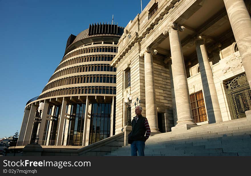 Tourist Looks Over City From Parliament Buildings.