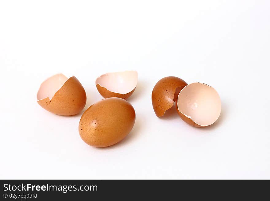 Brown eggs isolated on white