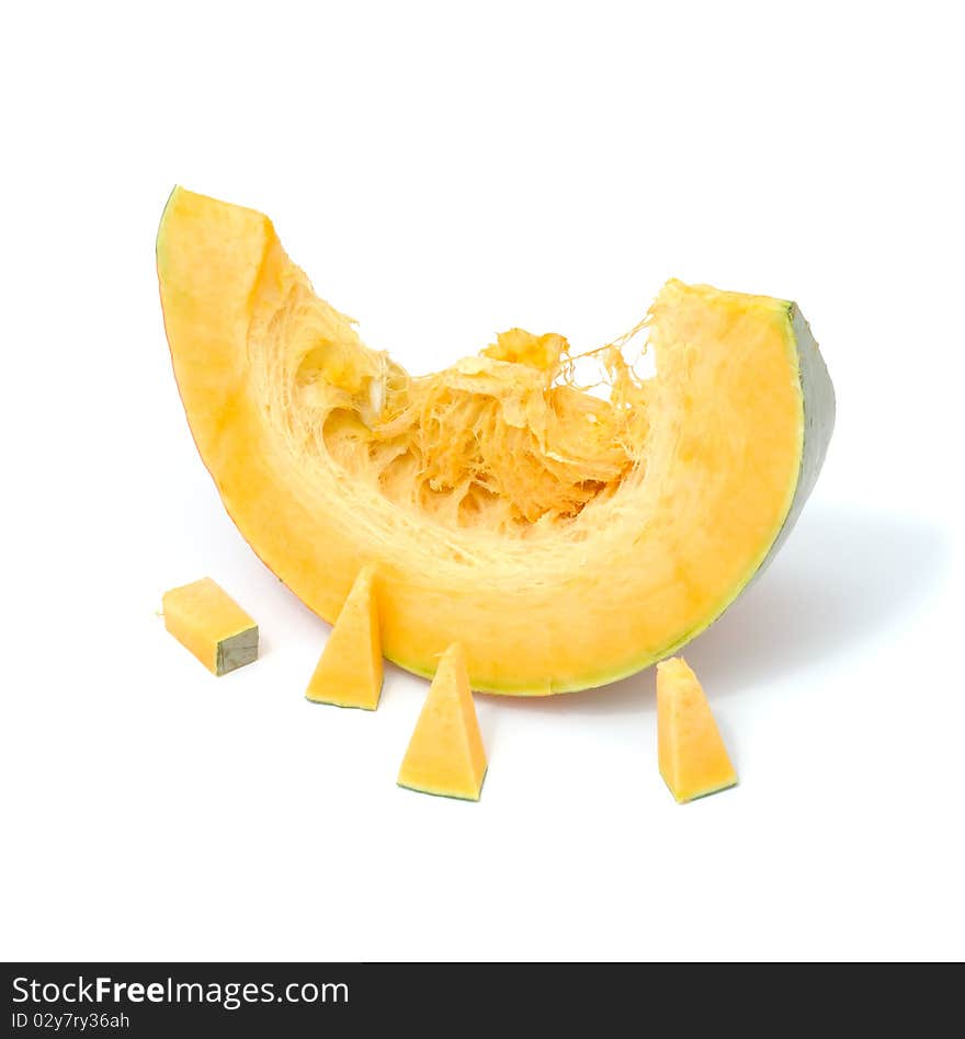 A piece of pumpkin isolated on a white background. A piece of pumpkin isolated on a white background