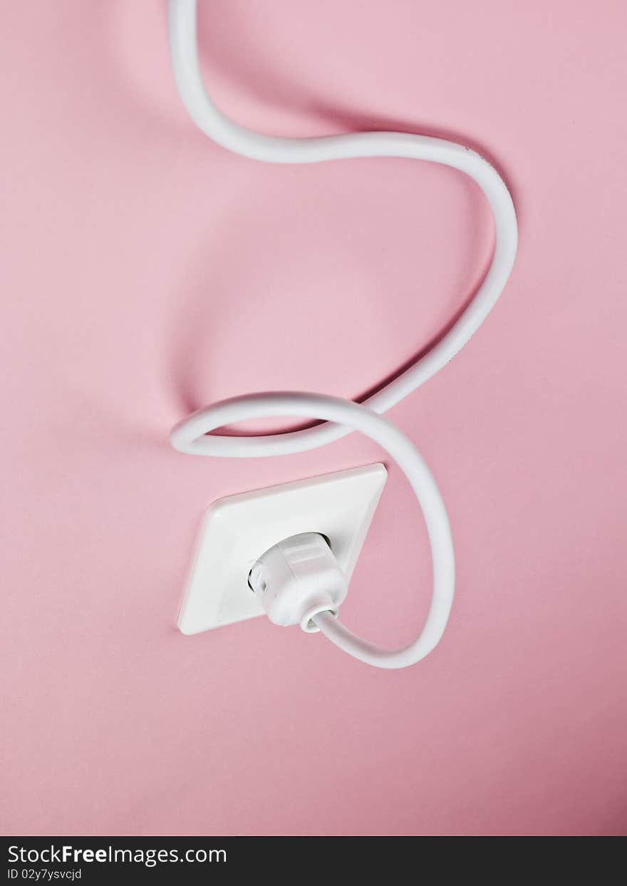 Electric Power Cable on Pink Background