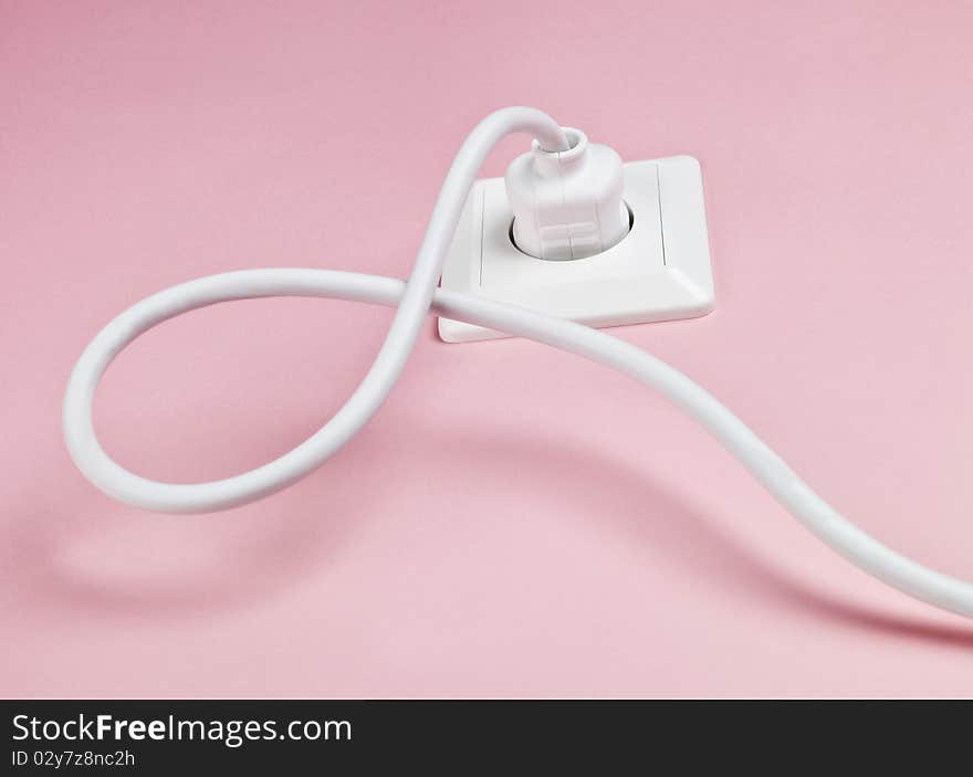 Electric Power Cable on Pink Background