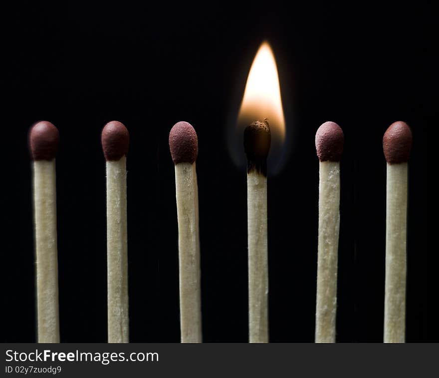 Group of Matches on black background