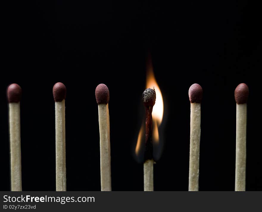 Group of Matches on black background