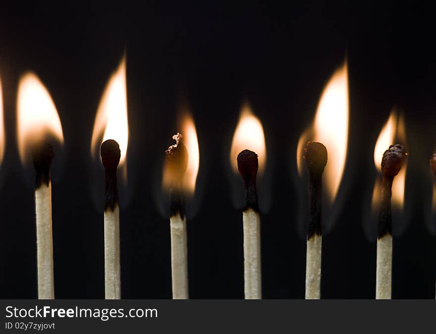 Group of Matches on black background