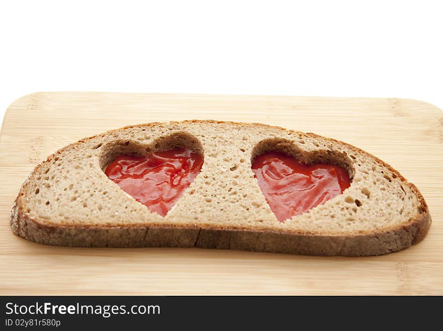 Heart in the bread and with ketchup