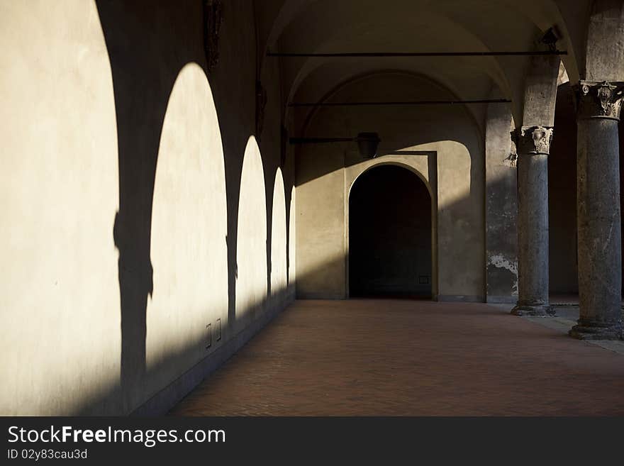 Shadow arches at the castle in Milan, Italy. Shadow arches at the castle in Milan, Italy