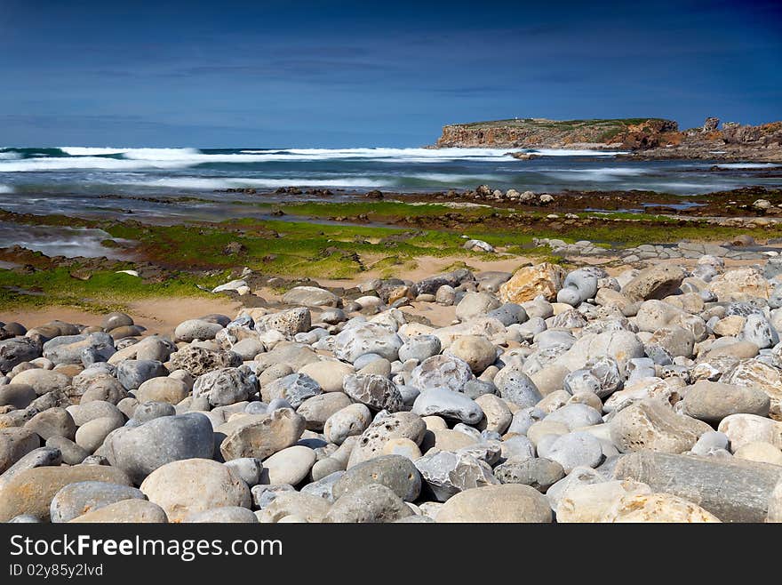 Sandy Beach With Rocks