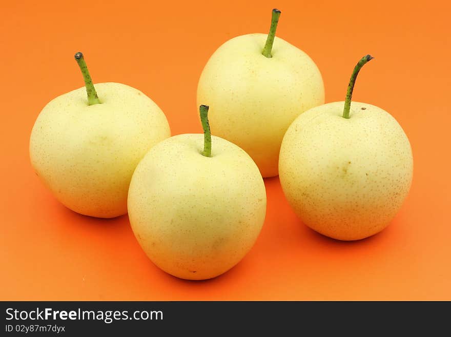 Four PEAR in the orange background