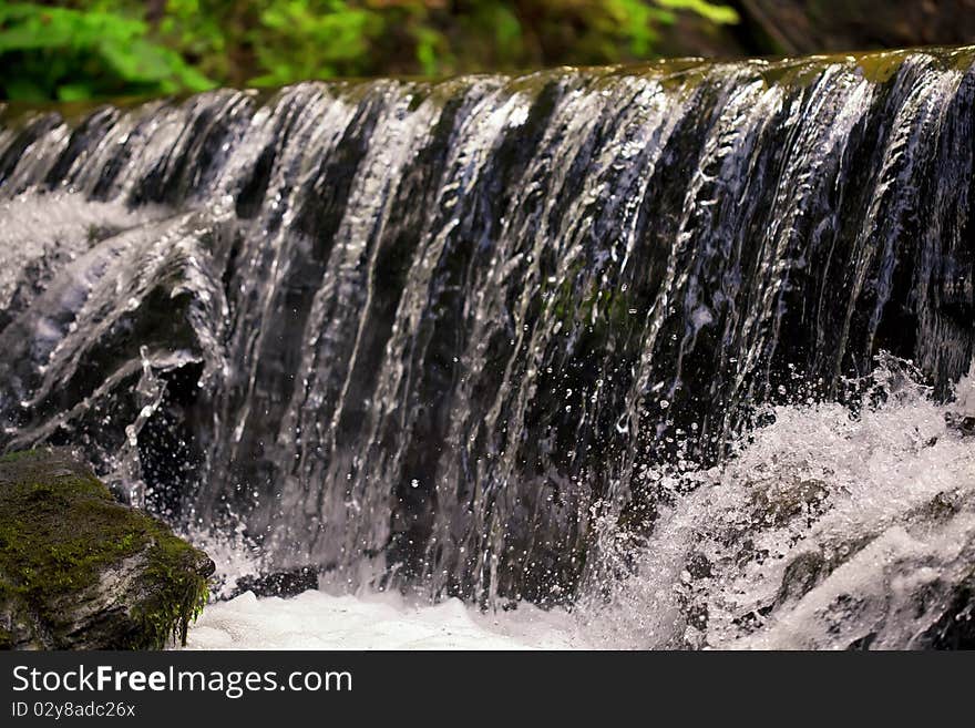 Waterfall Water cascade moss stones. Waterfall Water cascade moss stones
