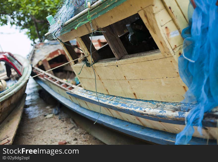 Old wooden fishing boat on the beach. Old wooden fishing boat on the beach