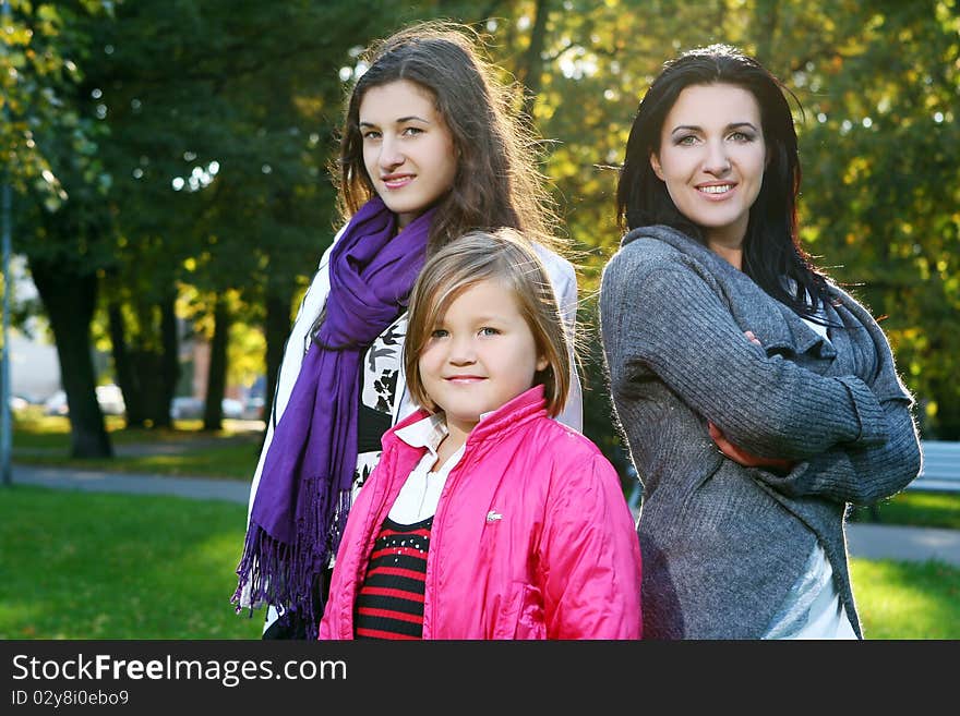 Family In Autumn Park