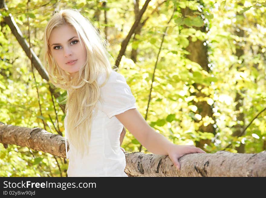 Young beautiful girl on natural background