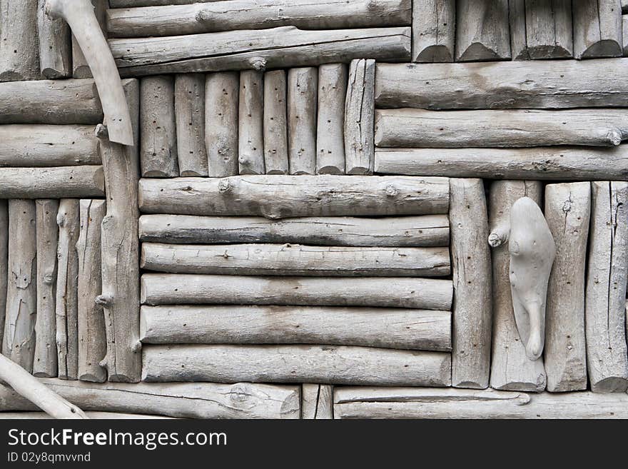 This is a closeup photo of a gray log exterior wall that is suitable for a background. This is a closeup photo of a gray log exterior wall that is suitable for a background.