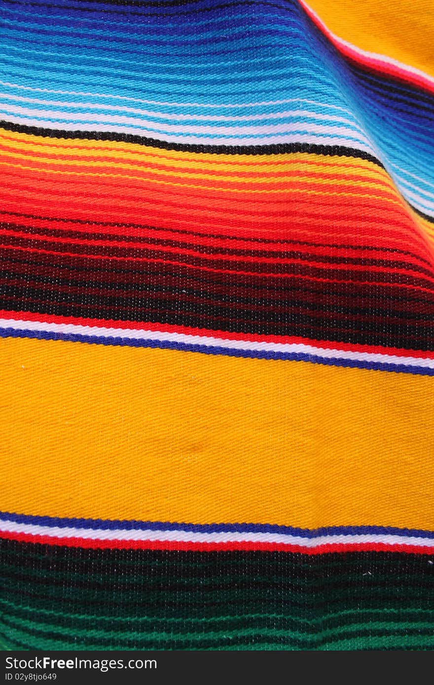 Mexican poncho showing several nice colors