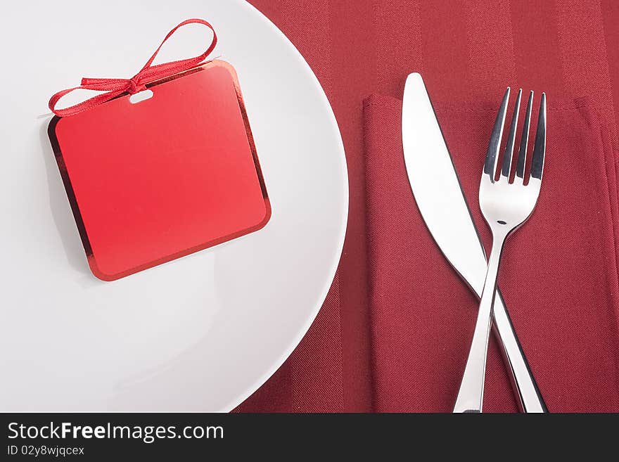 Little holiday cards on the table with the objects table set.