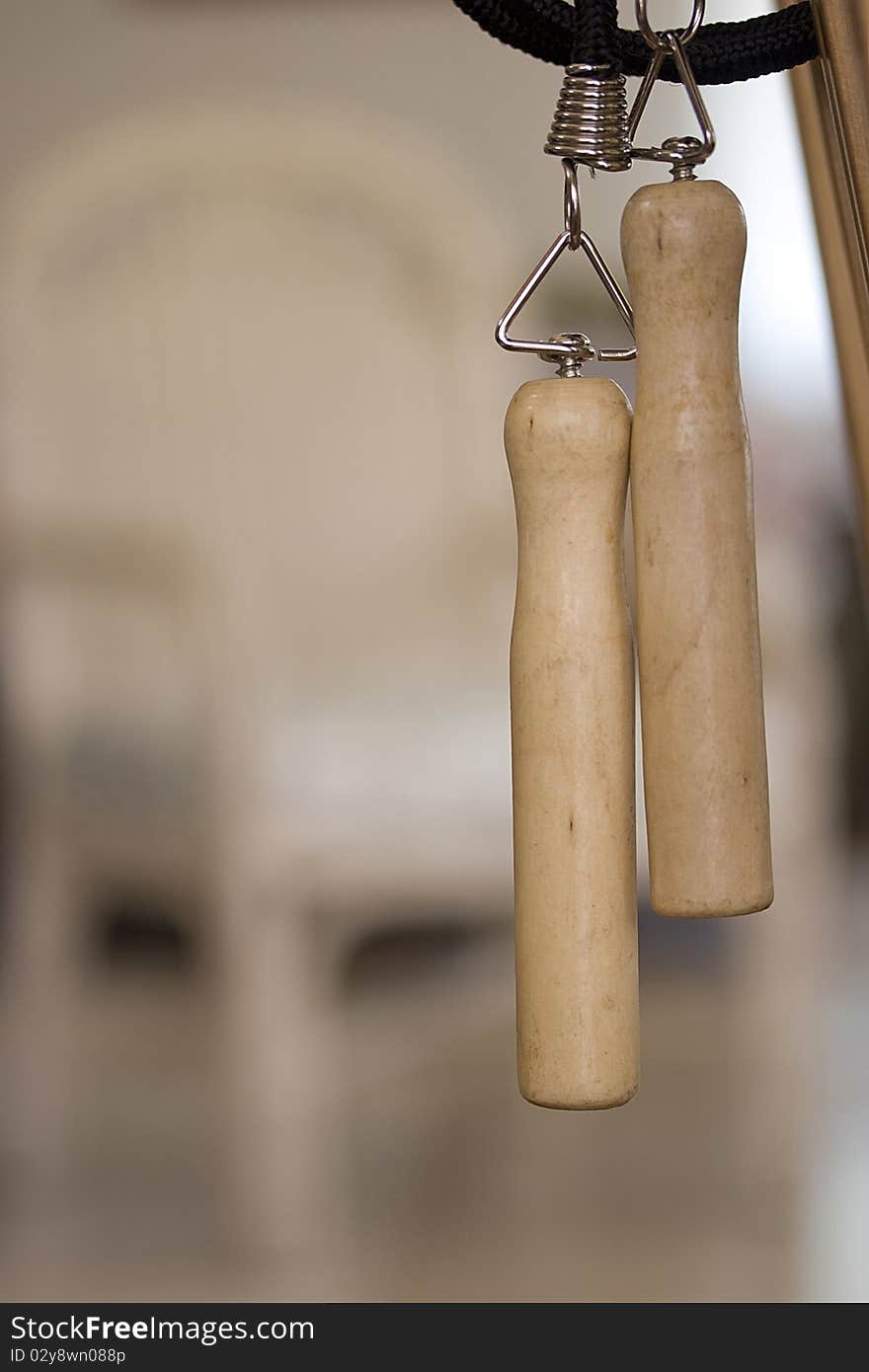 Close-up of two wooden jump rope handles.