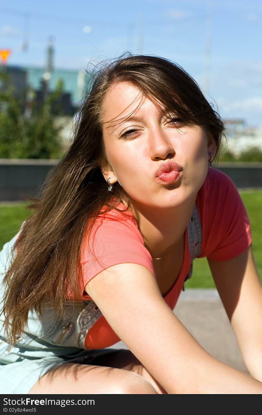 Young happy brunette on a sunny day. Young happy brunette on a sunny day