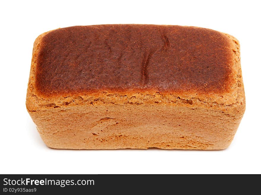 Loaf of fresh appetizing bread on white background