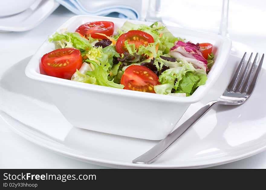 Fresh salad with vegetables and greens