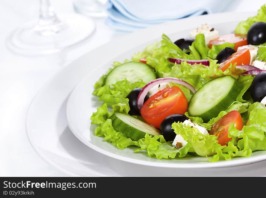 Fresh salad with vegetables and greens