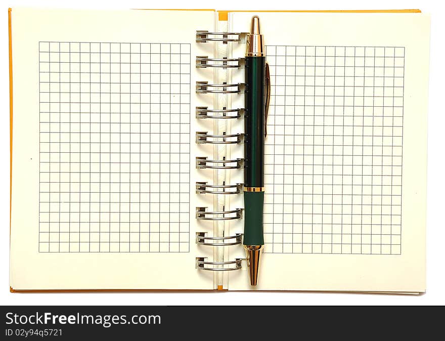 Open spiral bound notebook with pen on white