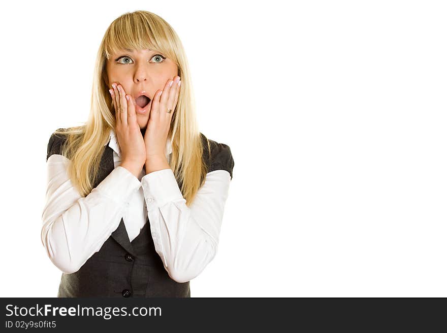 Beautiful young professional business woman expressed surprise, her hands lying on her face. Isolated on a white background