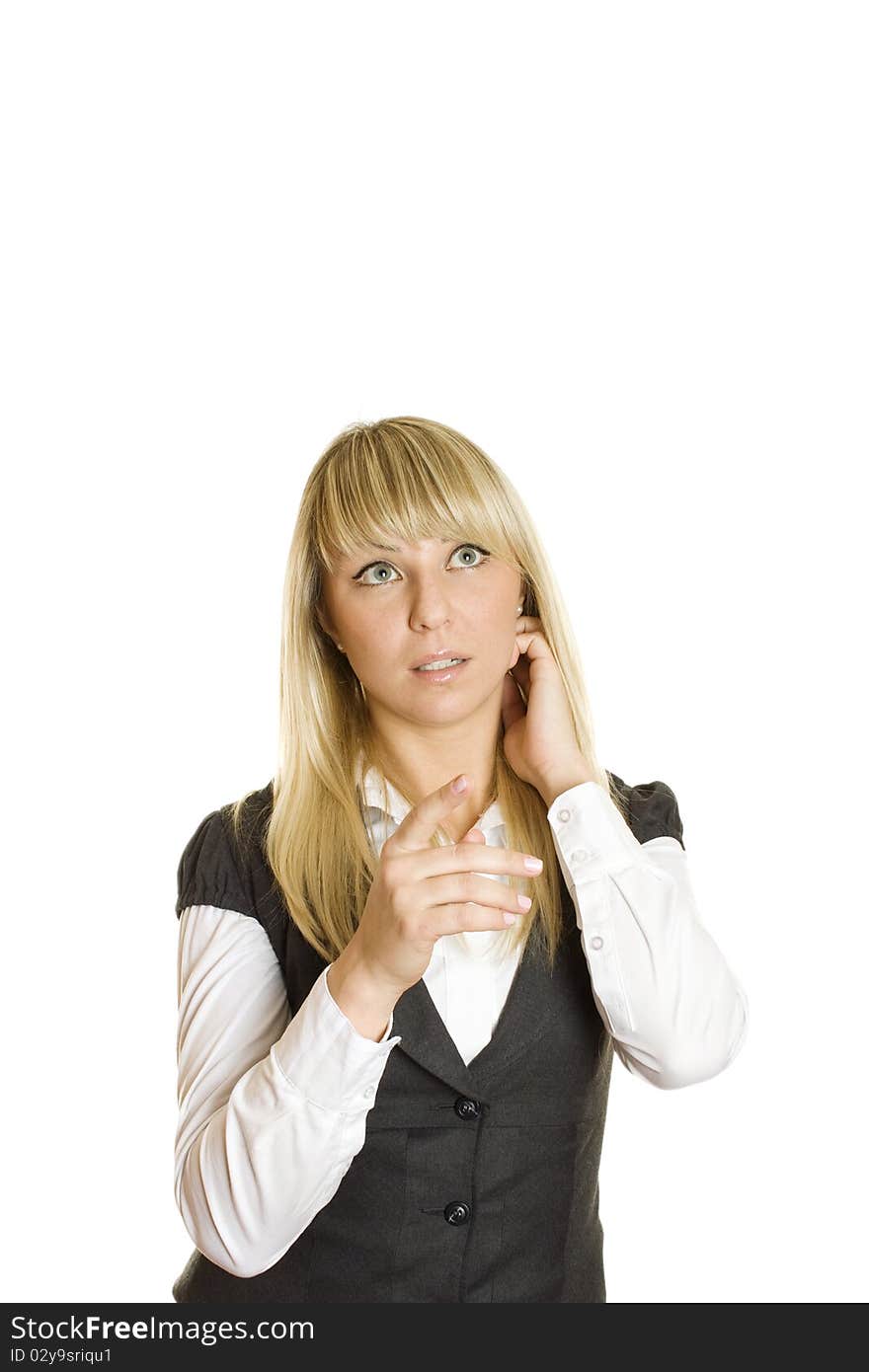 Beautiful young professional business woman expressed surprise, finger points toward the top. Isolated on a white background. Beautiful young professional business woman expressed surprise, finger points toward the top. Isolated on a white background