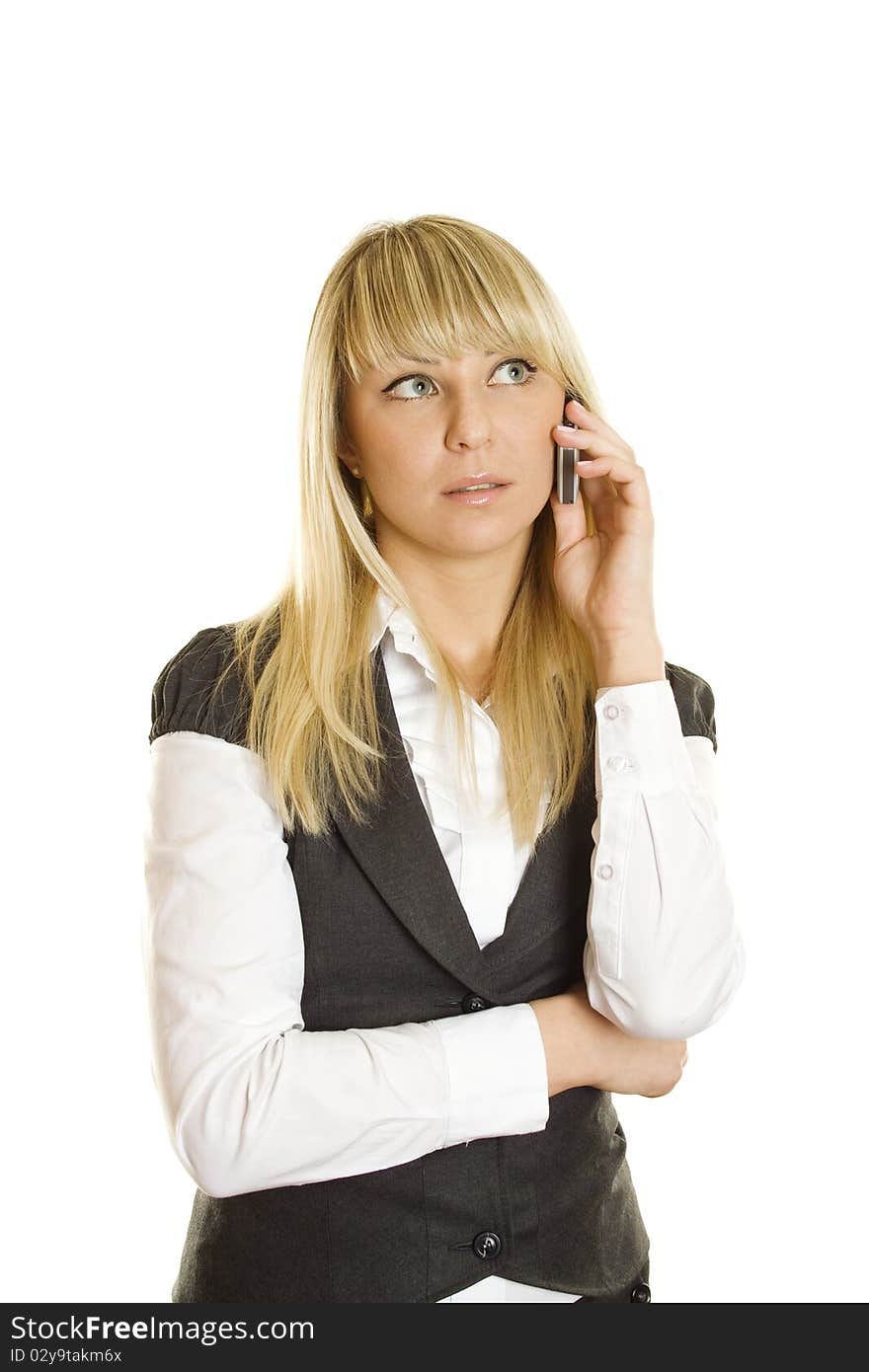 Close-up of young business woman talking on the phone. Lots of copyspace and room for text on this isolate. Close-up of young business woman talking on the phone. Lots of copyspace and room for text on this isolate