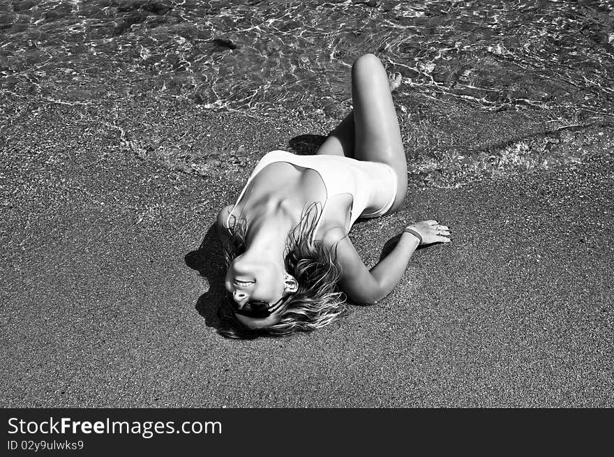 The harmonous girl enjoys fresh sea water. The harmonous girl enjoys fresh sea water