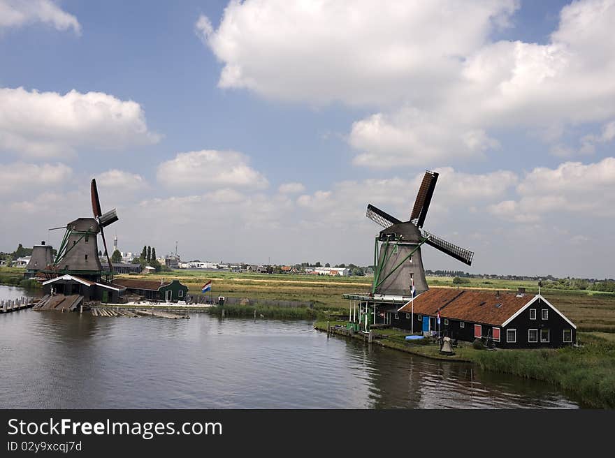 Dutch windmill on a canals edge