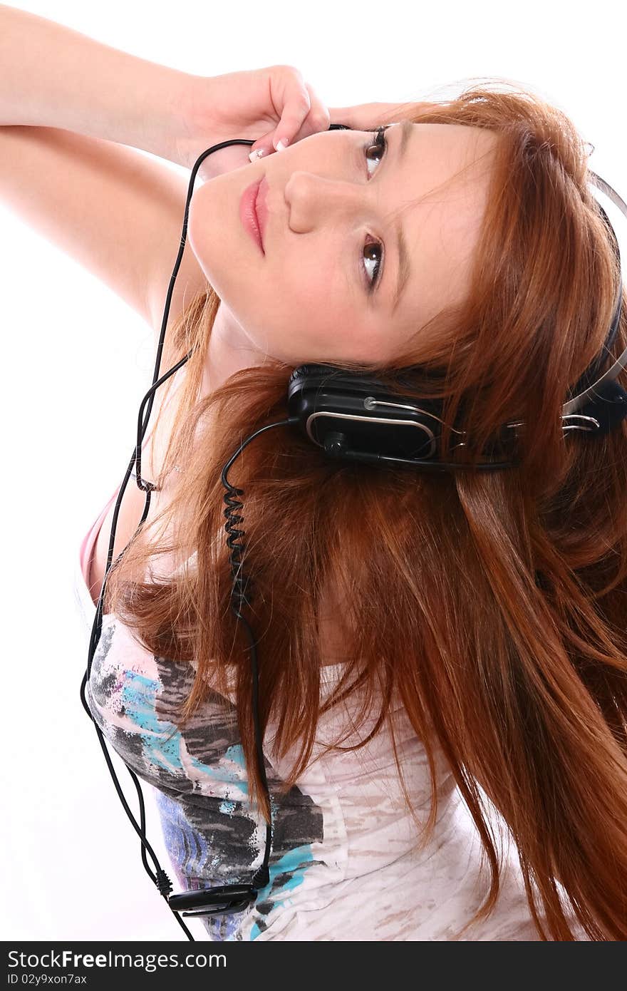 Beautiful redhead with headphones