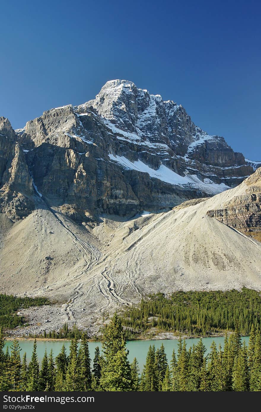 An overlook view of mountains and Bow Lake. Banff National Park, Alberta, Canada. An overlook view of mountains and Bow Lake. Banff National Park, Alberta, Canada